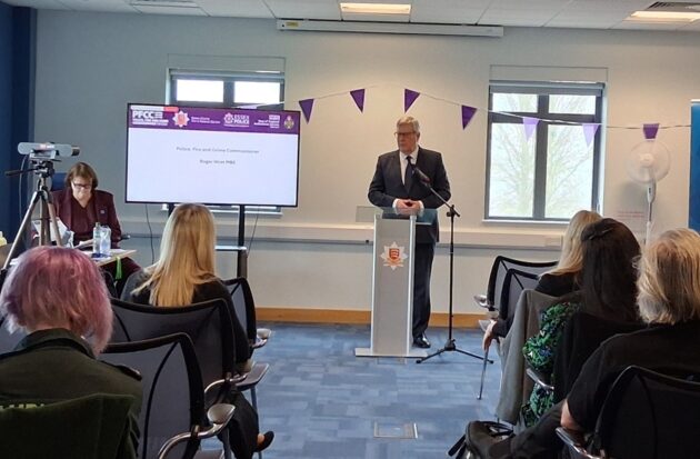Roger Hirst, speaking at International Women's Day conference photographed by Oliver