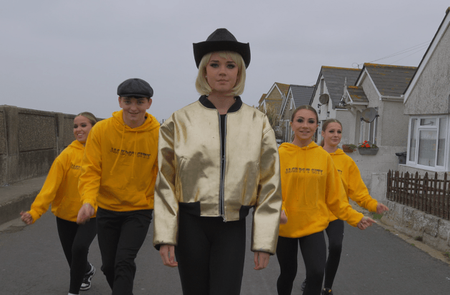 young people dancing on Jaywick seafront