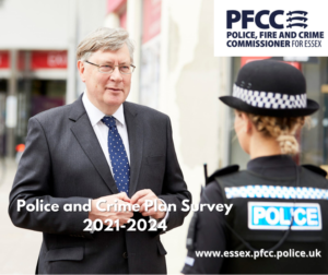 PFCC Roger Hirst talking to a police officer.
